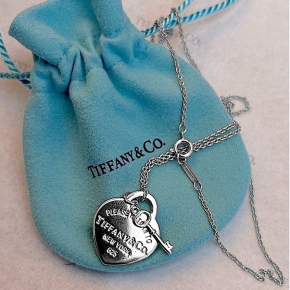 Tiffany & Co. Jewelry - Authentic Tiffany & Co. Silver Heart Stamped Pendant and Key Necklace.